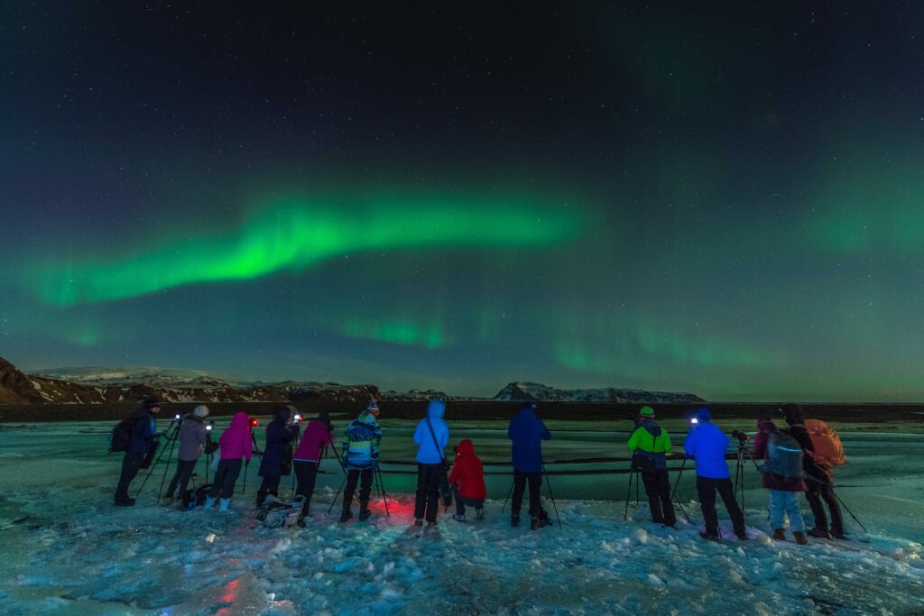 People Photographing Aurora Borealis