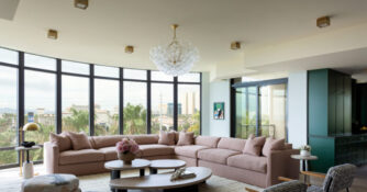 Pink Sectional in Living Room in Las Vegas Condo by Danilla Villamil