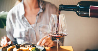 Pouring Wine in Restaurant