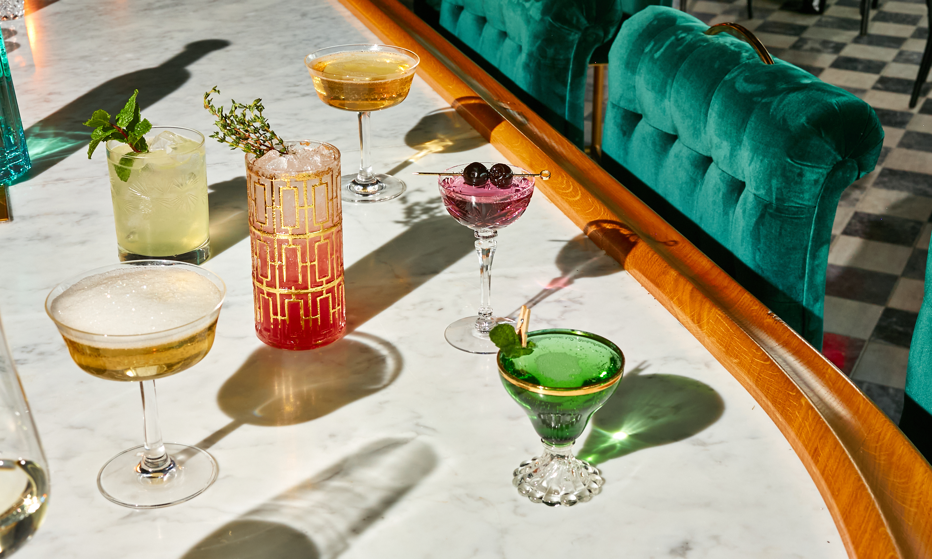 enjoy-luties-expertly-crafted-drinks-including-signature-cocktails-zero-proof-cocktails-and-a-curated-wine-and-beer-list