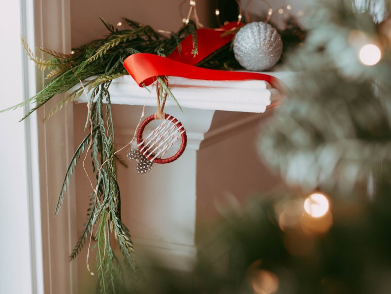 red hoop ornament on mantle