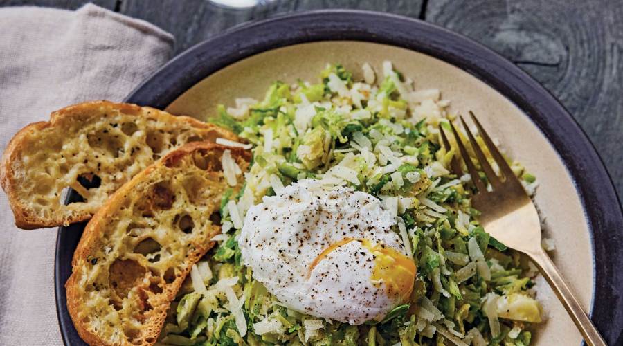 Warm Brussels Sprout Caesar with Poached Egg