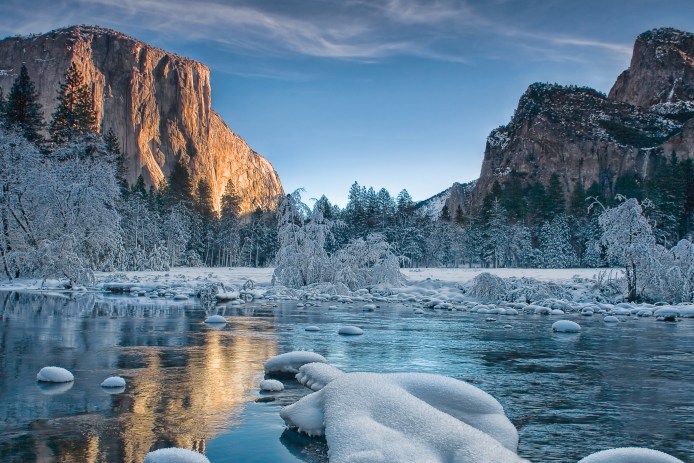 A sunrise over the Yosemite Valley floor coated with rime ice