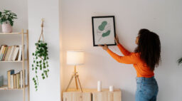 Woman Hanging Artwork