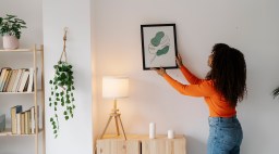 Woman Hanging Artwork